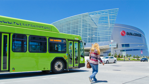 Tranist bus passes by BOK Arena